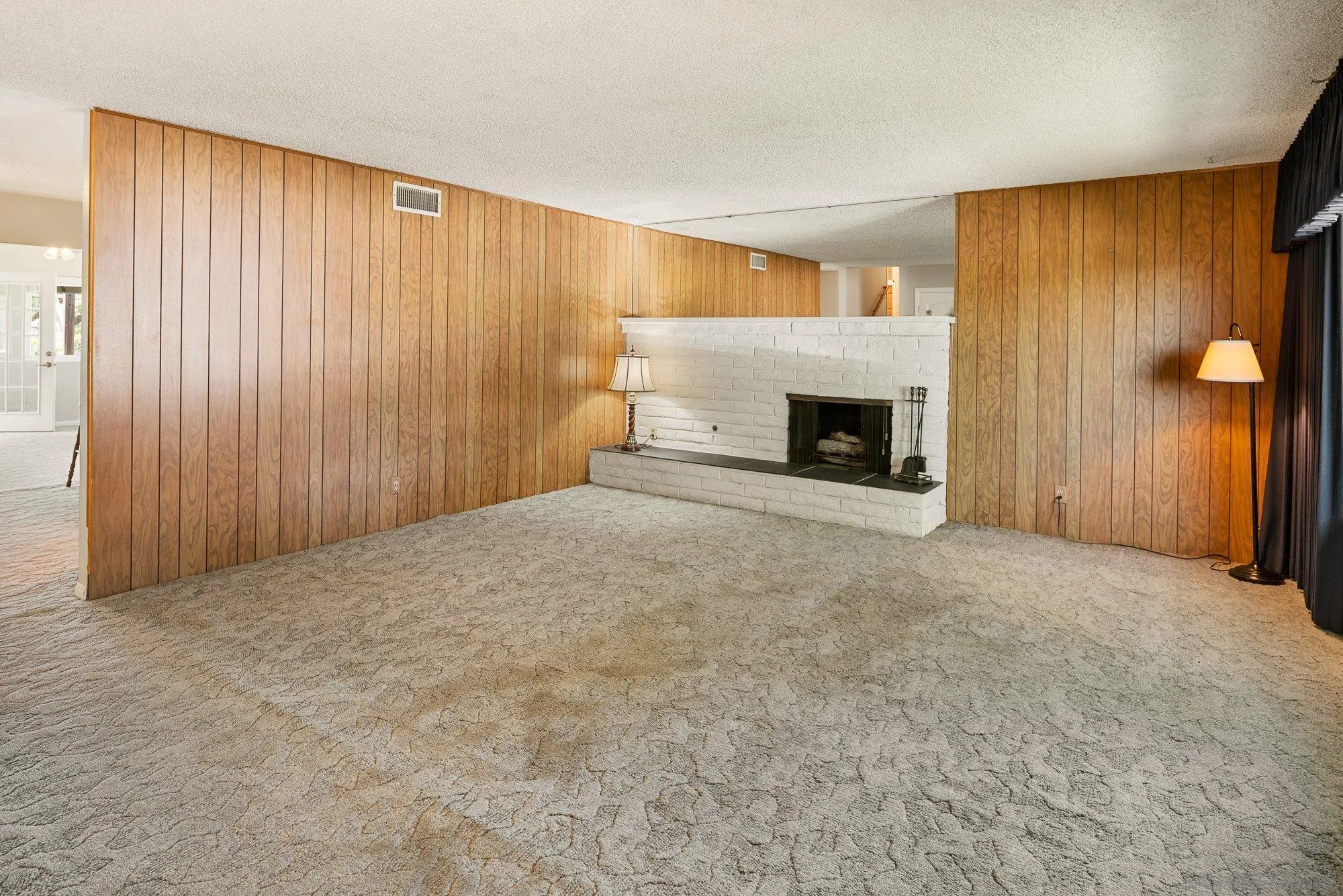 6010 Chadwick Ave, San Diego, CA 92139 Very large living room with gas fireplace.