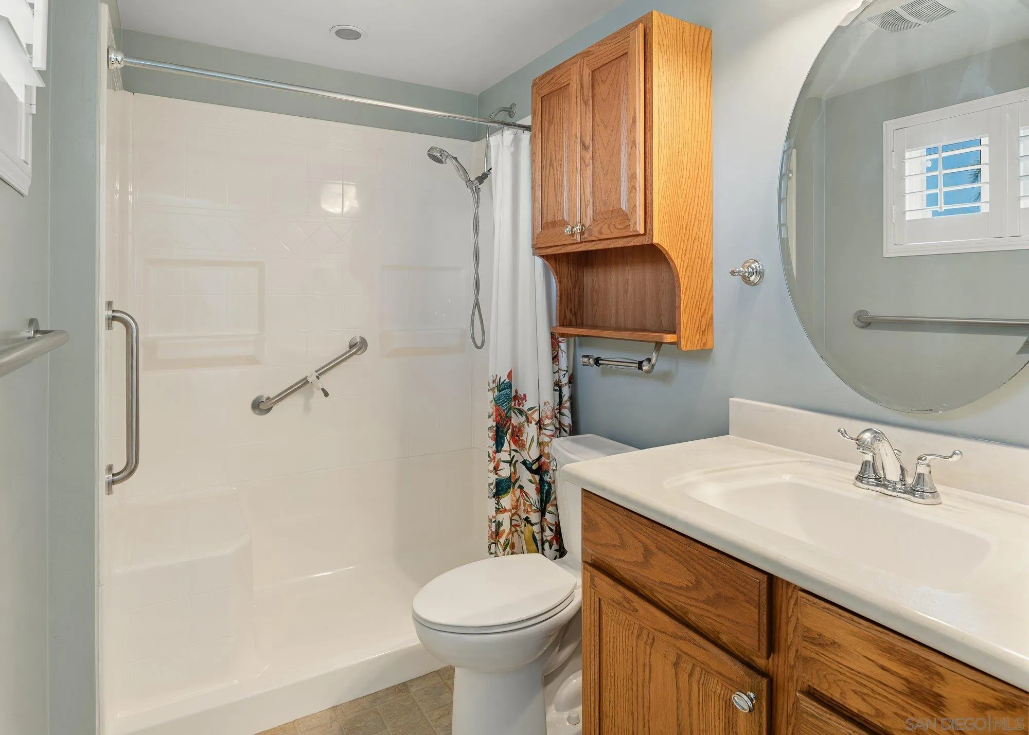6010 Chadwick Ave, San Diego, CA 92139 Walk-in shower ensuite primary bedroom.