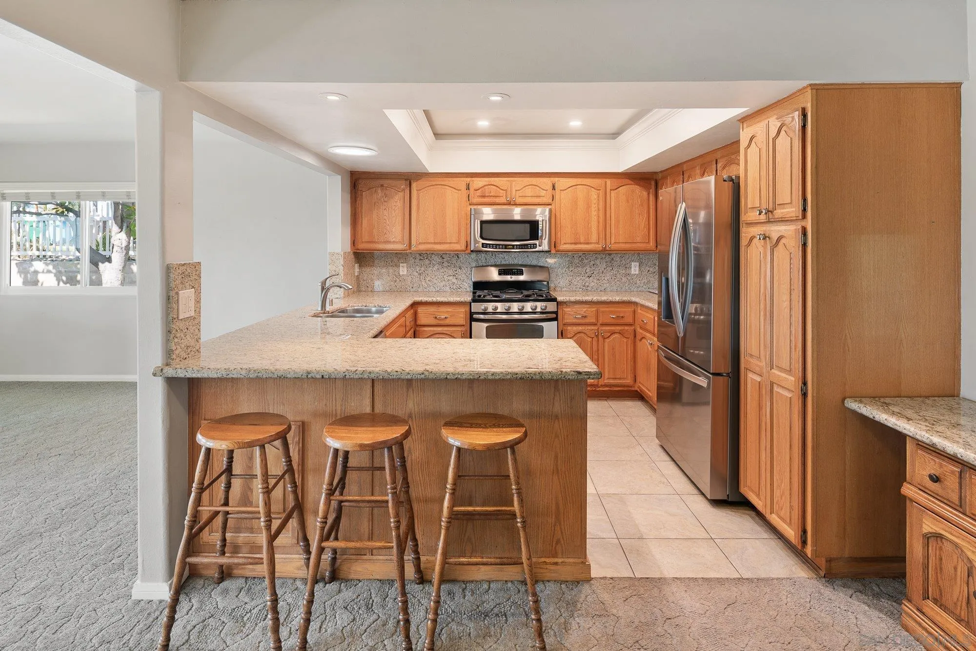 6010 Chadwick Ave, San Diego, CA 92139 Solar tube light over sink. Eat at counter top.