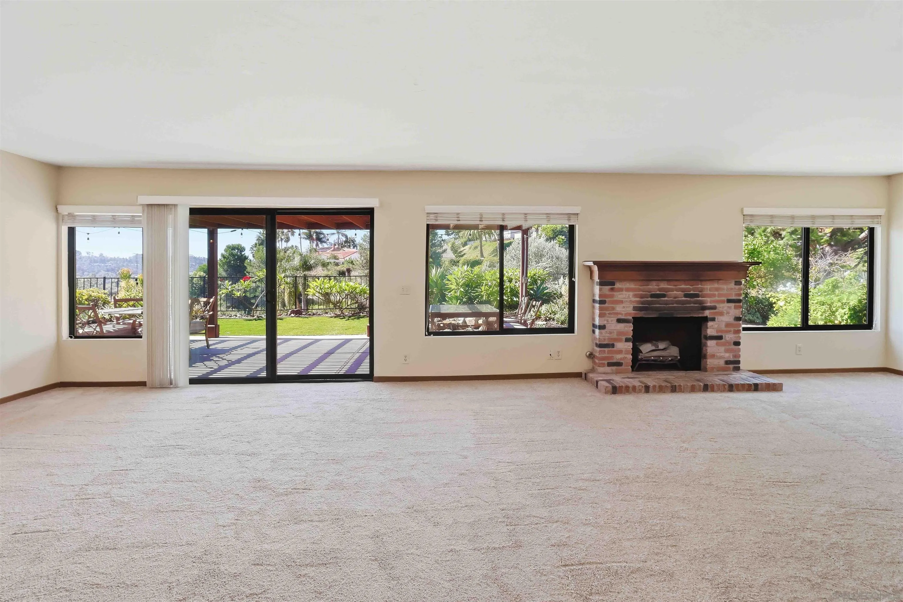 2365 Carriage Cir, Oceanside, CA 92056 Family Room looking out toward Backyard