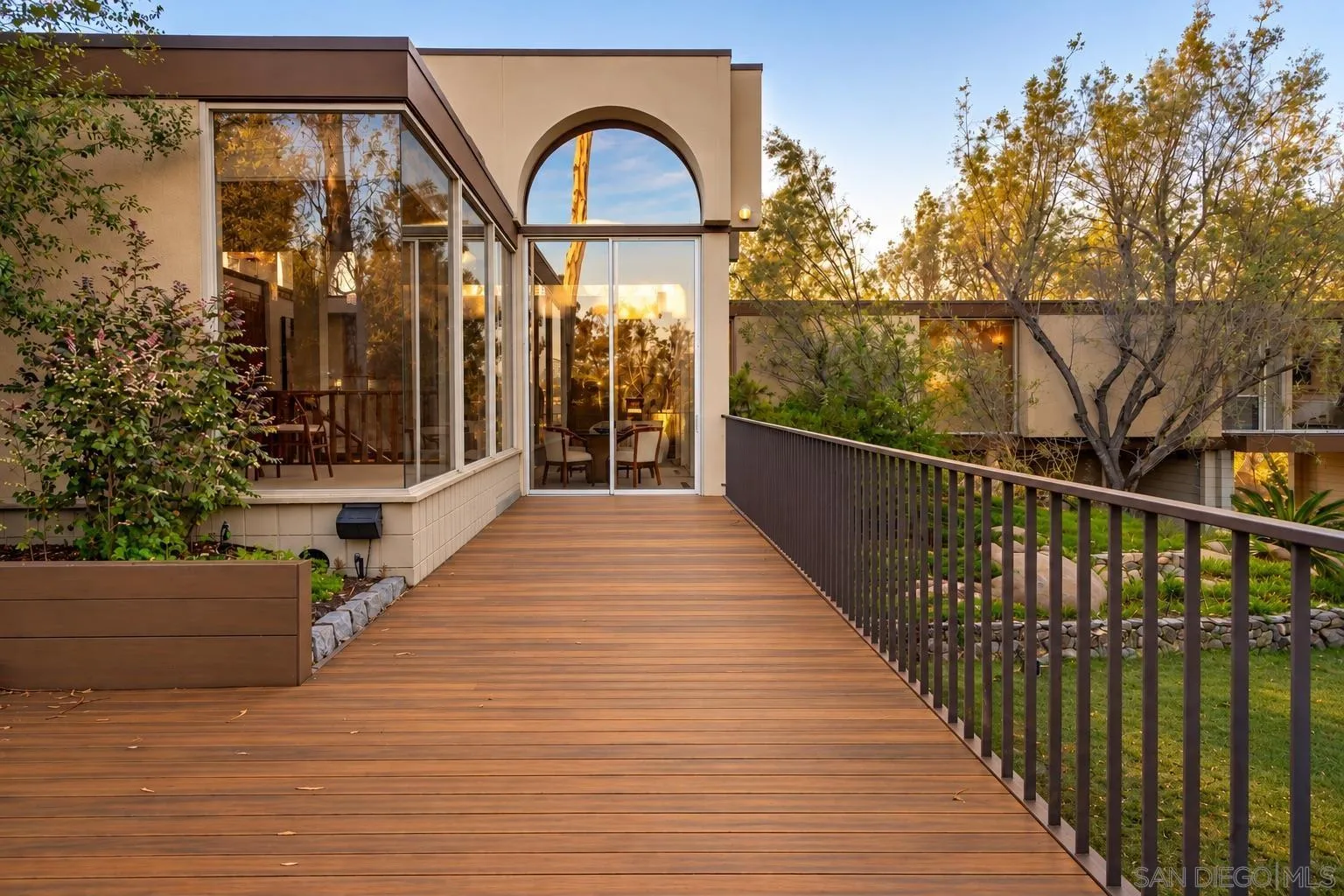 Digitally altered to show potential with refurbished decking.