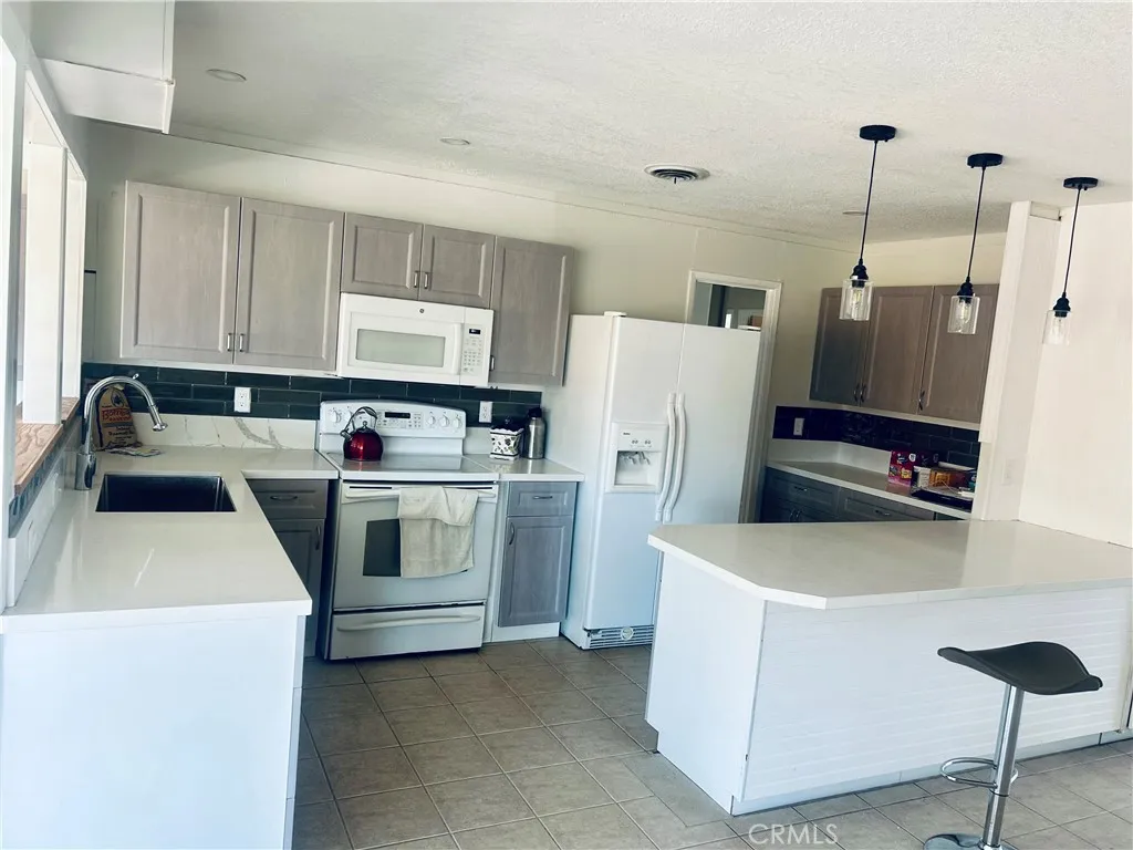 https://cdn.realtyfeed.com/cdn/127/306241333/6281127bdc7d1666e8f7f8fcd40b6a45.webp
