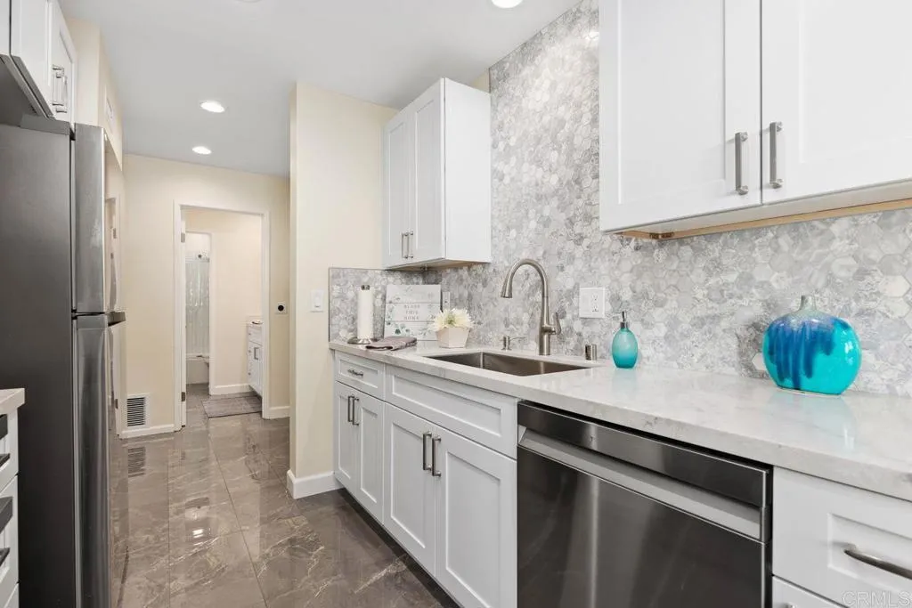 https://cdn.realtyfeed.com/cdn/127/306333467/6446ded31ae500f958458125fc8158a8.webp