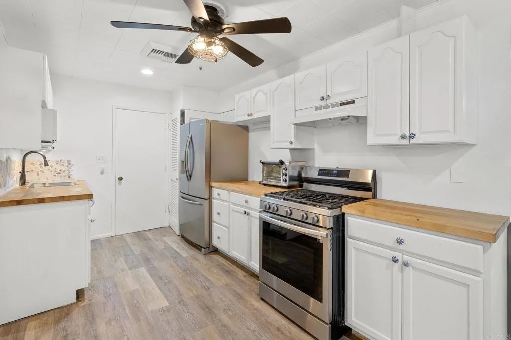 https://cdn.realtyfeed.com/cdn/127/306441127/4594fe63488d5b892331421db9331c74.webp