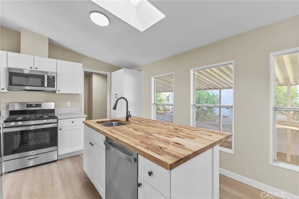 https://cdn.realtyfeed.com/cdn/127/306505777/43b88eff930640316d27421a8d67596a.webp