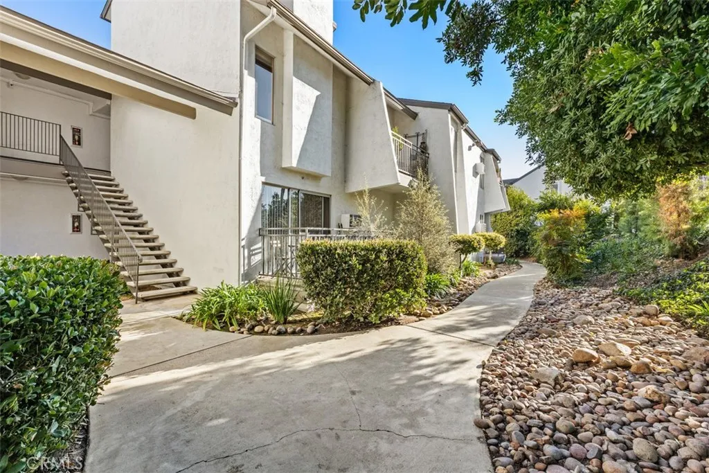 More Details about MLS # OC25190690 : 7506 PARKWAY DRIVE UNIT 104