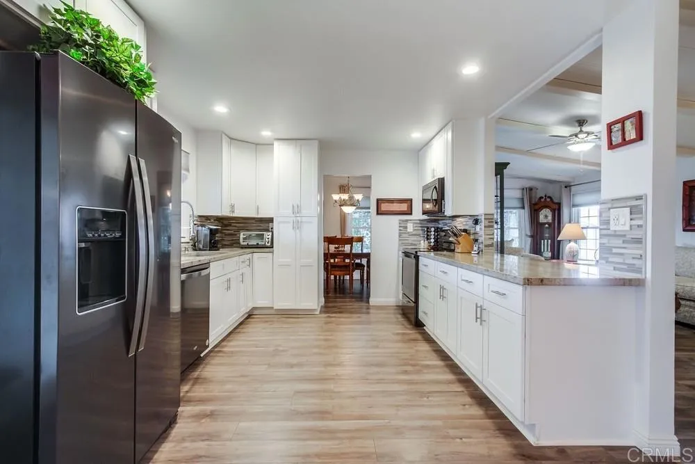 https://cdn.realtyfeed.com/cdn/127/306565681/8a80fda715fc24de7b758c4510901d55.webp