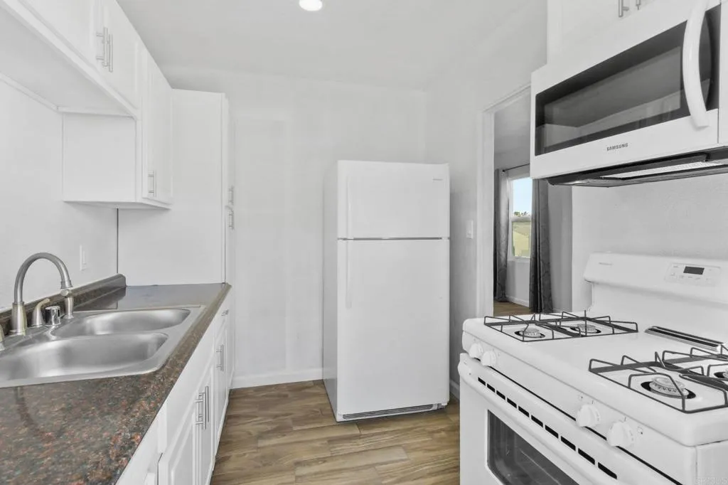 https://cdn.realtyfeed.com/cdn/127/306607451/e2274b716217c4ec8bd59a0a82432509.webp