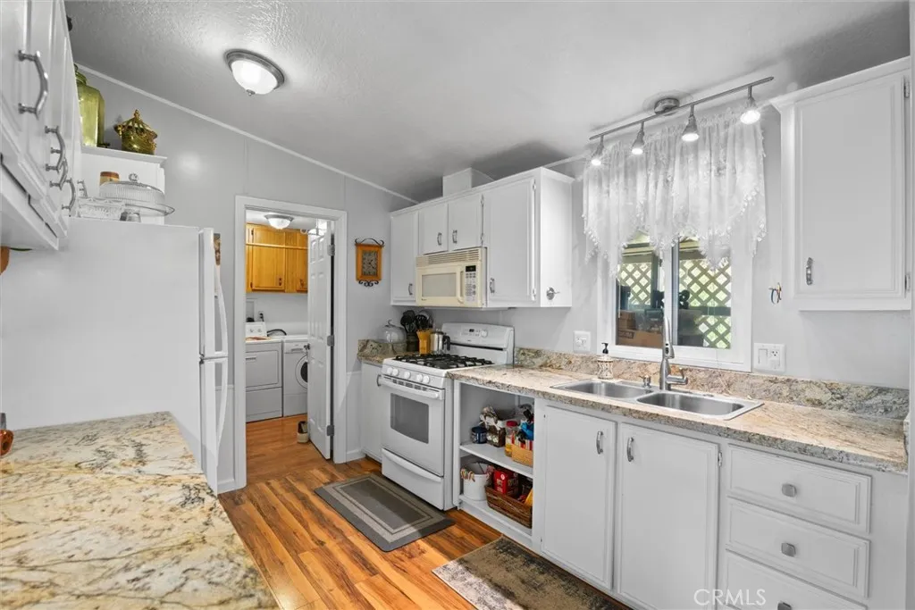 https://cdn.realtyfeed.com/cdn/127/306616373/bc6215e166467aca351435f073e9e985.webp
