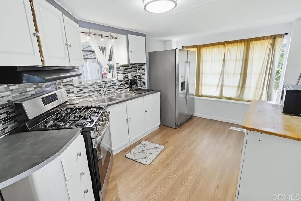 https://cdn.realtyfeed.com/cdn/127/306620888/a00729a5b2618d69b35a457ea49b66e8.webp