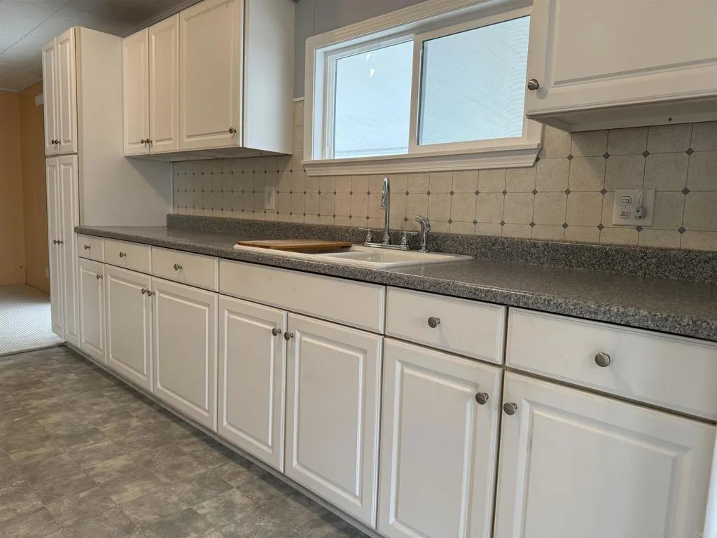 https://cdn.realtyfeed.com/cdn/127/306644414/b8f8ee76532704032891db26796ab088.webp