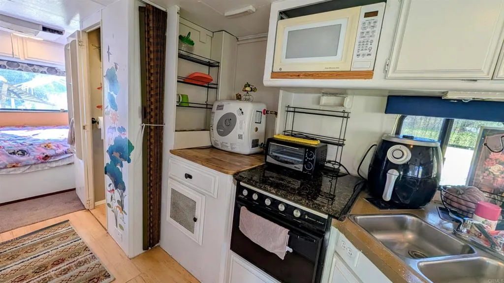 https://cdn.realtyfeed.com/cdn/127/306646019/843d6065c60731eaa7a2cd531cdfaabb.webp