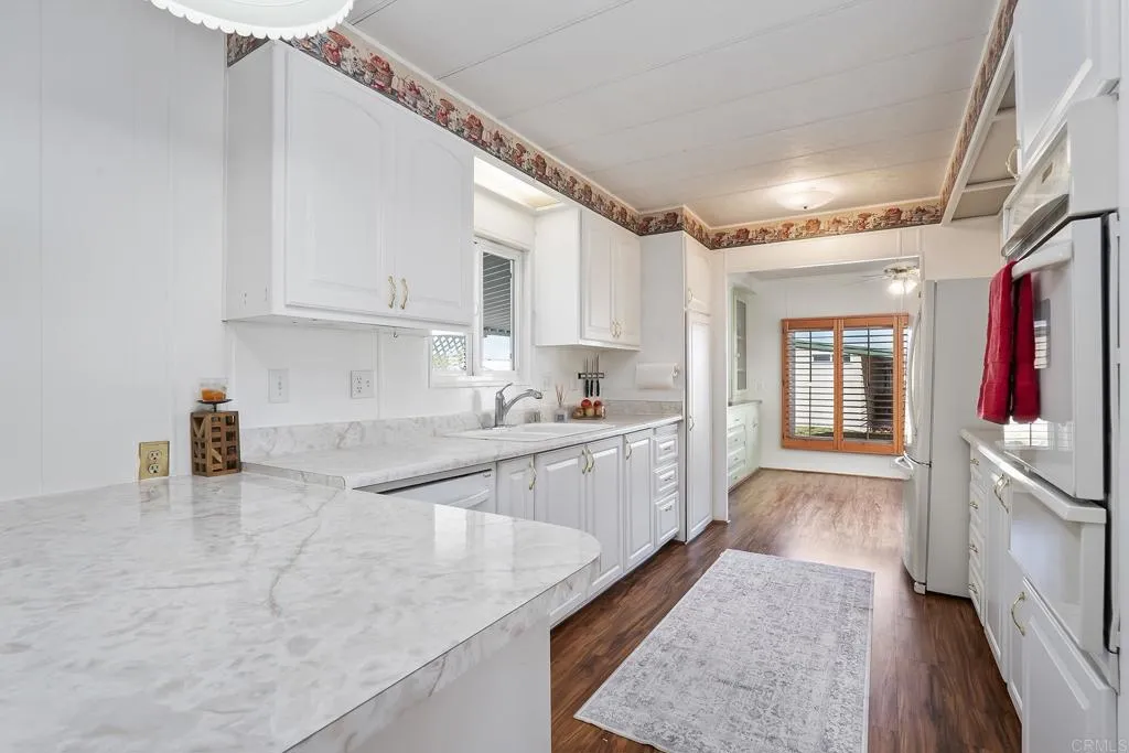 https://cdn.realtyfeed.com/cdn/127/306653416/41962ab86009456a7c787de6140231ab.webp