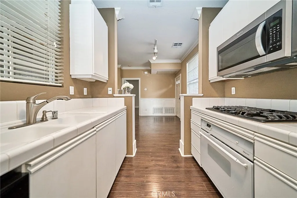 https://cdn.realtyfeed.com/cdn/127/306663797/80f976ace551ec1033a194bda87946b5.webp