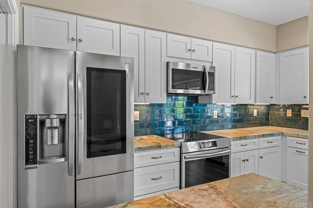 https://cdn.realtyfeed.com/cdn/127/306687887/33f90fcb29c98babb57c68e0b034469e.webp