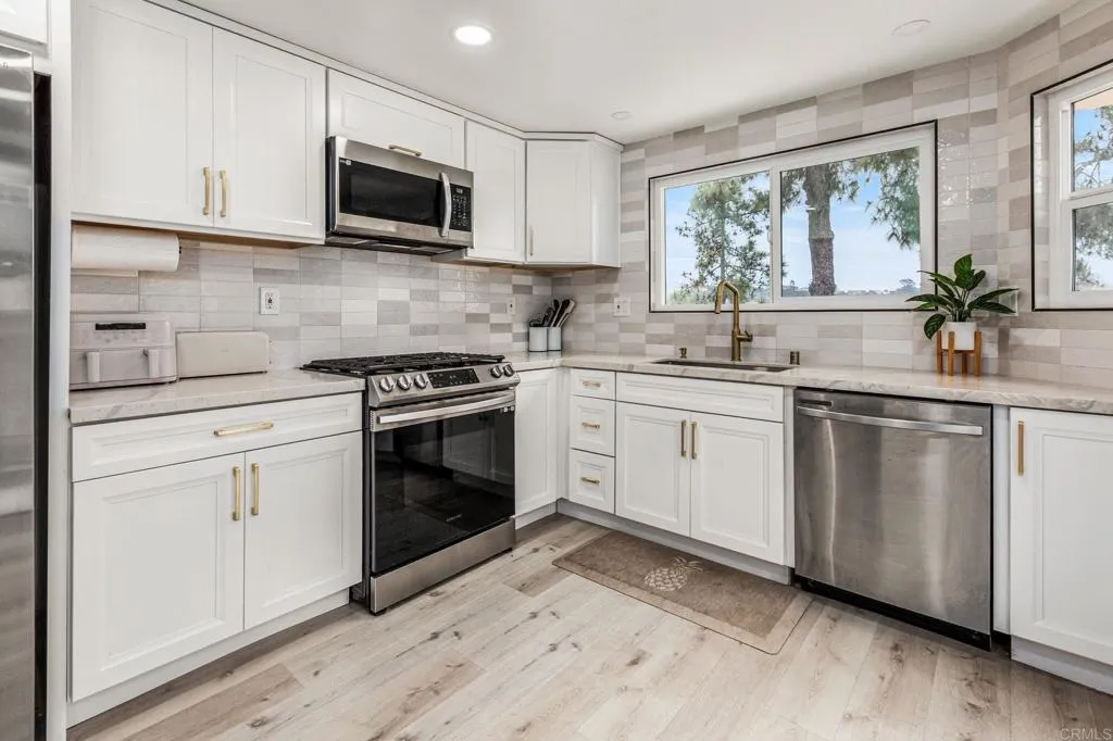 https://cdn.realtyfeed.com/cdn/127/306736563/3cba179f3dfc43a2f163431cc78088cd.webp
