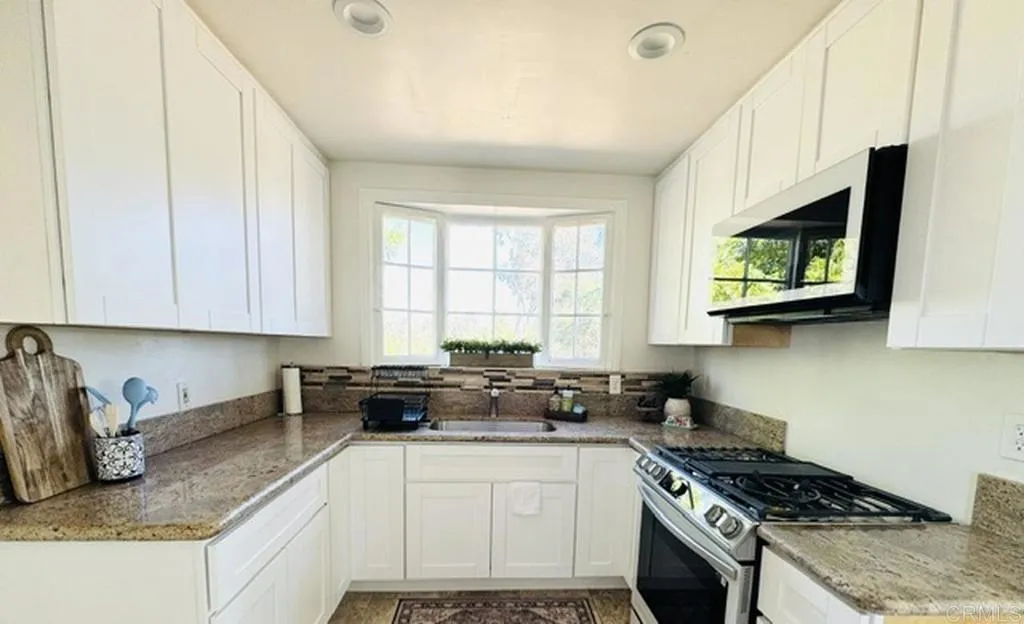 https://cdn.realtyfeed.com/cdn/127/306748413/3179dba1595d2af0a7e557a2d050d421.webp