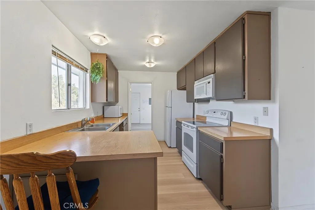 https://cdn.realtyfeed.com/cdn/127/307066892/dcfe1b8312eae7c02c25a24543196b81.webp