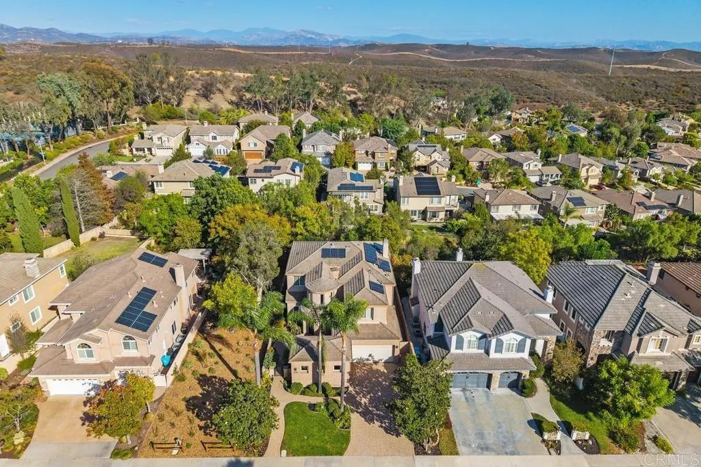 12755 Fairbrook Rd, San Diego, CA 92131 Aerial View of the home, open space and back