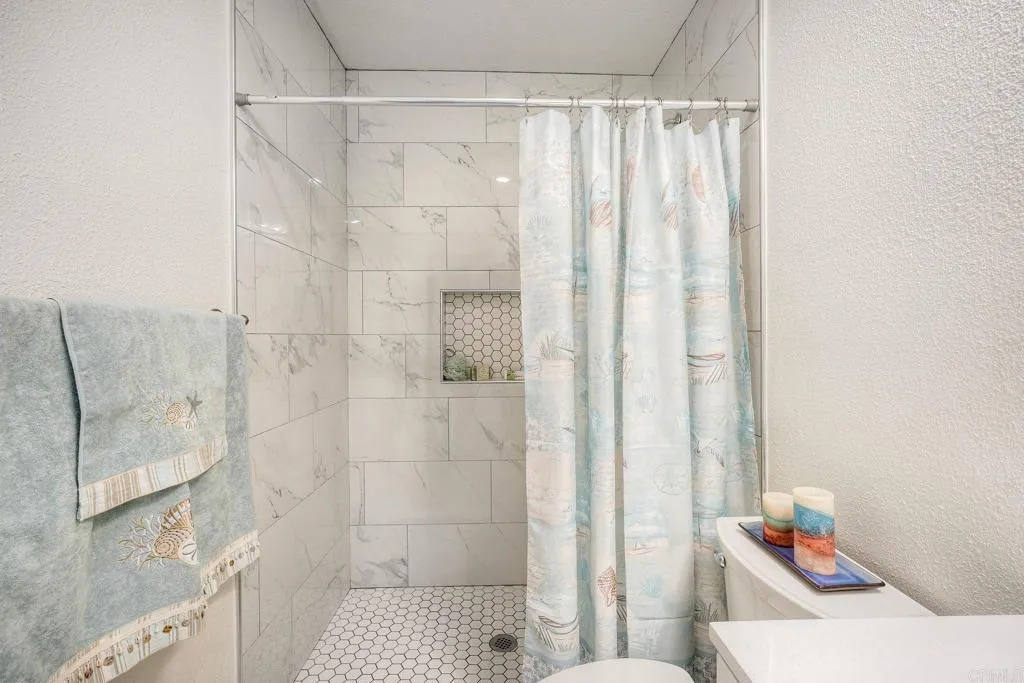 Another walk-in shower - tastefully renovated.