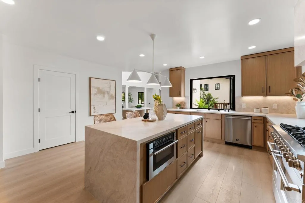 Taj Mahal - Quartz Countertops w/ waterfall edge Front Home 4771 Del Mar