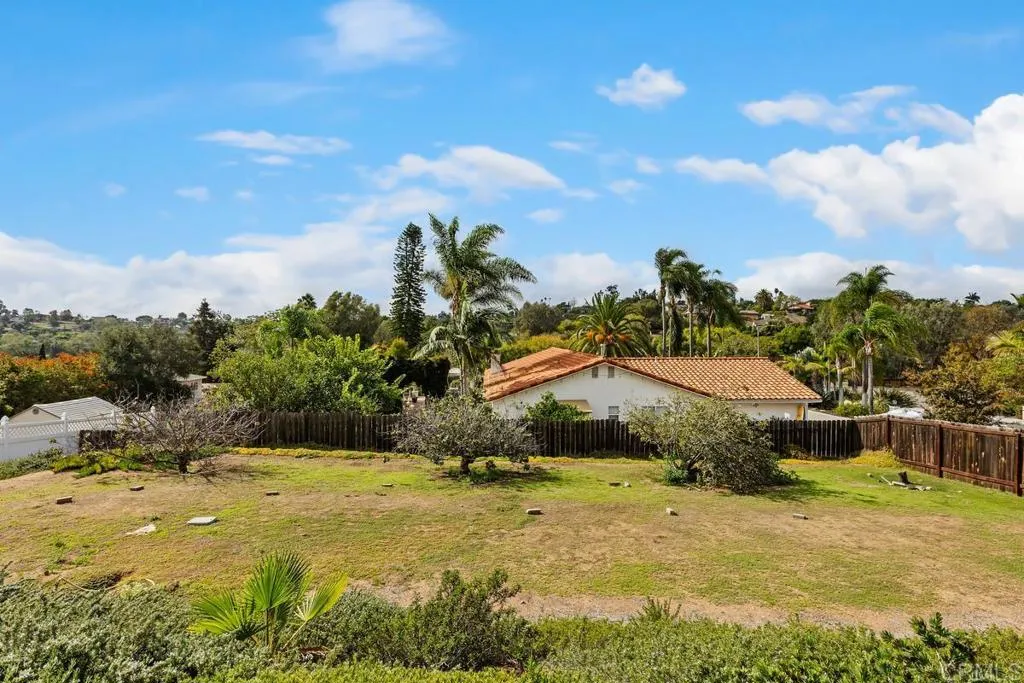1198 Tres Ninos Corte, Vista, CA 92084 This land is part of the property and is great for an ADU, RV parking, garden, pool, you name it