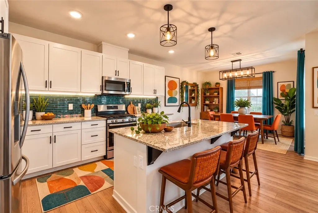 Kitchen with bar seating (digital staging)