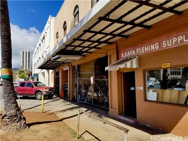 Close up of K. Kaya Fishing Supply & Lanakila Marine Services spaces & adjoining 3 story retail/warehouse/office building.