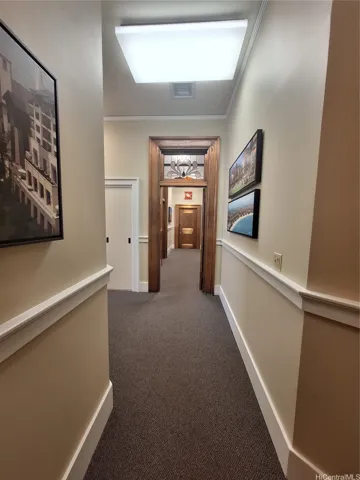 Entrance to Suite 204 at end of hallway