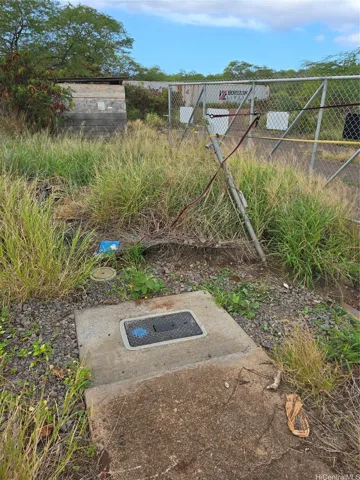 Visible water meter at the beginning of the property.