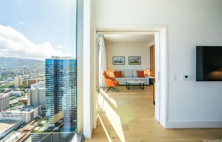 Step into a world where the sky, city, and majestic mountain range converge, all within the comfort of your private penthouse residence.