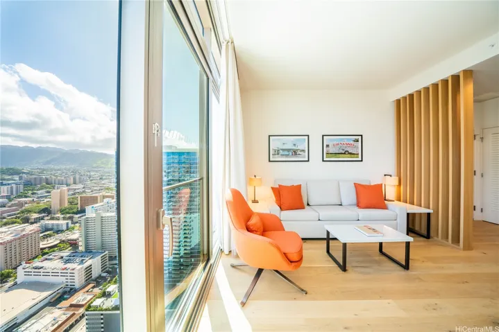 Warm, earthy tones and natural textures merge with the beautiful mountain range and the city scape outside. A private home away from home in the Sky.