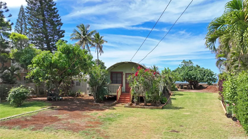 Adorable 3 bedroom 1 bath Quonset home with public water, electricity, sewer.
