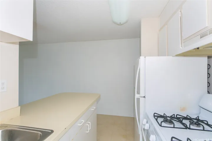 View from kitchen sink to hall