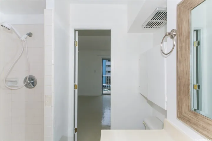 bath including shower and view to den