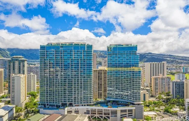 Diamond Head Tower to the right and the newer of the 2. Entire 27th floor is available for sale.
