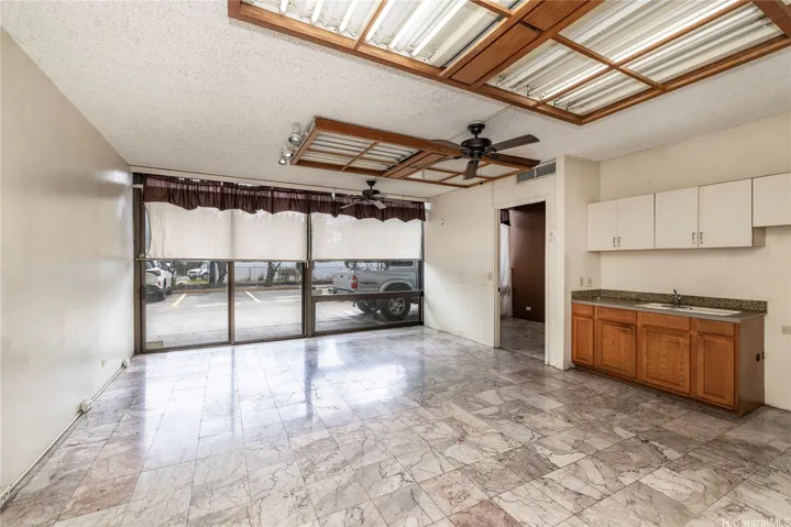 Huge, bright, and open main office area with one assigned parking right outside.