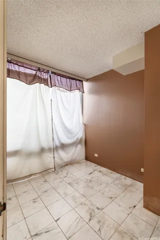 Smaller room, great for private office or storage.
