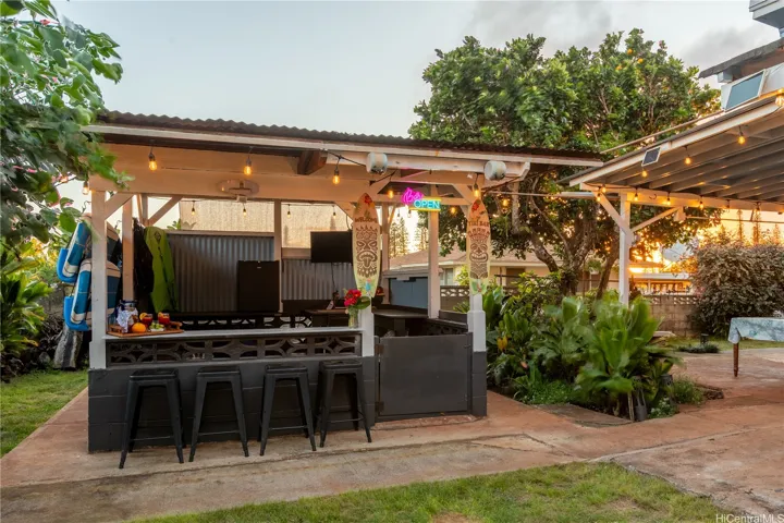 After a day of hunting or going to the beach, kick back and drink a Mai Tai in your backyard tiki bar!
