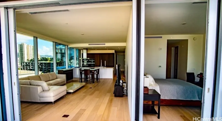 From the lanai looking at the living area and main bedroom.
