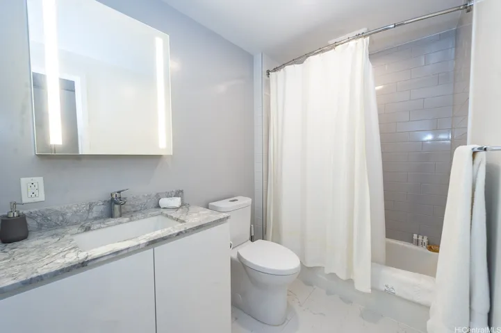 Tile and Marble Floor Bath