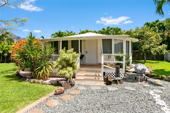 Two cute Makaha cottages plus luxury studio on beachfront lots with stunning ocean views.