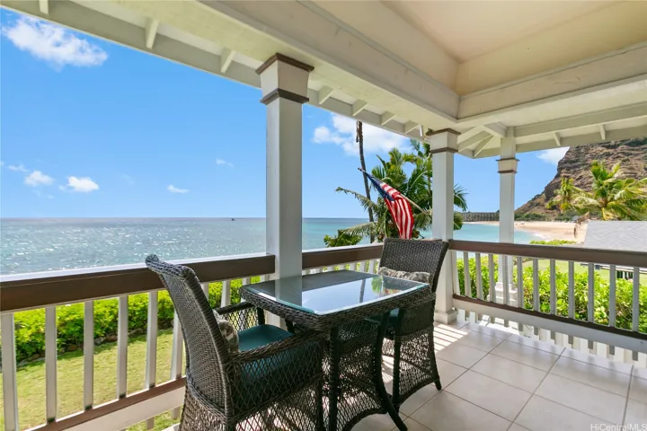 Makaha beachfront home offers stunning sunset views from your private deck. Enjoy peaceful oceanfront living with direct beach access, reef protection, and panoramic mountain and sea vistas.
