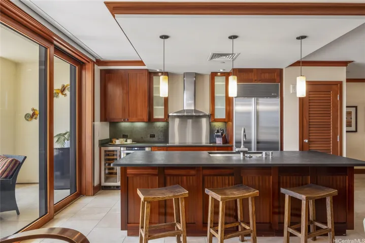 Bright Kitchen perfectly situated between the Living room, Lanai and Dinning area.