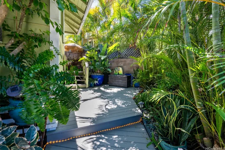 Lush tropical oasis entry with room for storage of toys