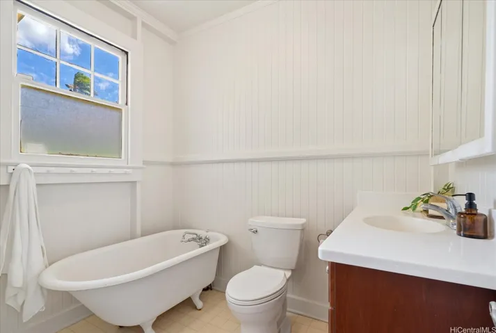 Original 1929 clawfoot bathtub; not shown in the photo but this downstairs bathroom also has a shower with a door making it also accessible from outside!