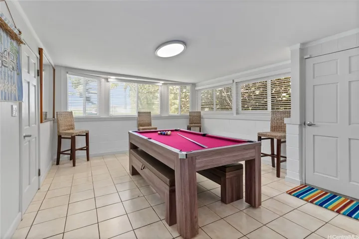 The guest or rental area features ocean views and a fun, versatile space with a convertible pool/Ping Pong table—perfect for entertaining or relaxing.North Shore Haleiwa Hawaii.