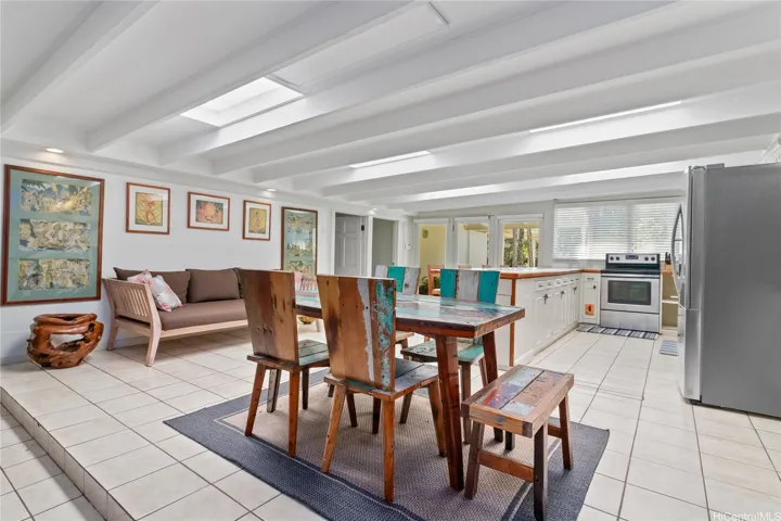 A second kitchen and dining area provide added convenience for guests or rental income opportunities, enhancing the home’s versatility. North Shore Haleiwa Hawaii.