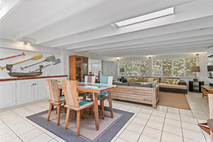 A spacious additional living room at the back of the home provides flexible space—perfect for family visits, entertaining, or even rental income potential. North Shore Haleiwa Hawaii.