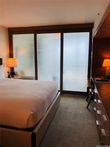 The sliding door allows privacy between the bedroom and living area